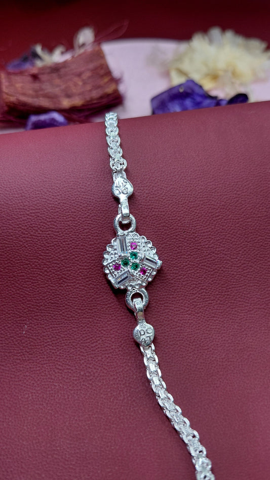 Regal Radiance Silver Rakhi Bracelet